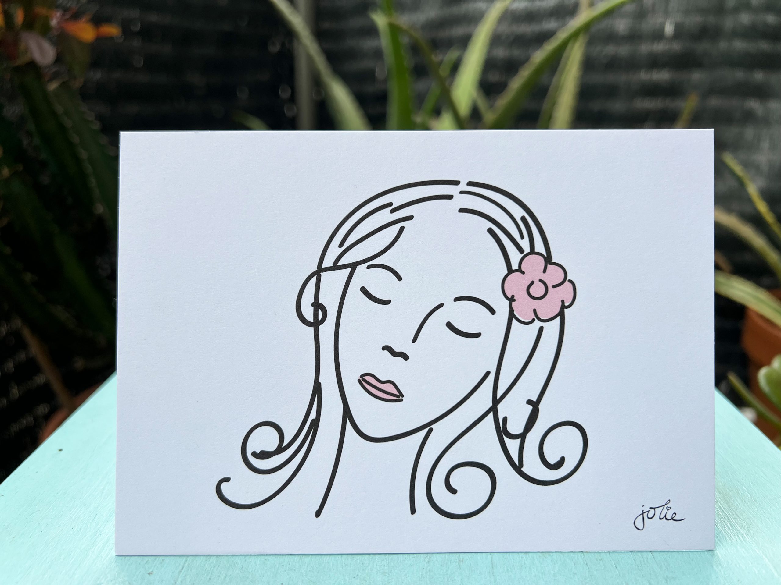 dame-mit-blume-im-haar